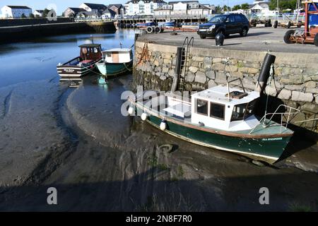 The boats on dry land due to a severe drought and the receding tide Stock Photo