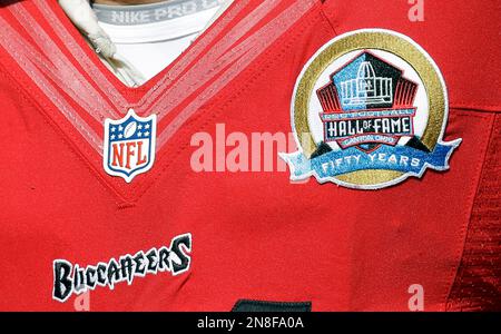 Former NFL player Bryant Young poses with his bust during an induction  ceremony at the Pro Football Hall of Fame in Canton, Ohio, Saturday, Aug.  6, 2022. (AP Photo/David Dermer Stock Photo 