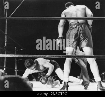 A life in pictures World heavyweight champion Joe Louis and challenger  Jersey Joe Walcott compare like this for…