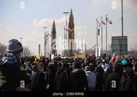 Tehran, Tehran, Iran. 11th Feb, 2023. Two Iranian-made built surface-to-surface missiles are displayed at the Azadi (Freedom) tower during the annual rally commemorating Iran's 1979 Islamic Revolution in Tehran, Iran, February 11, 2023. Iran on Saturday celebrated the 44th anniversary of the 1979 Islamic Revolution amid nationwide anti-government protests and heightened tensions with the West. Tens of thousands of Iranians hit the streets in Tehran and other cities today to mark the 44th anniversary of the Islamic revolution after months of anti-government protests. The events mark the 44th Stock Photo
