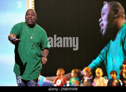 DJ Lance Rock, left, and Plex perform onstage at Yo Gabba Gabba! Live!: Get  The Sillies Out! 50+ city tour kick-off performance on Thanksgiving weekend  at Nokia Theatre L.A. Live on Friday