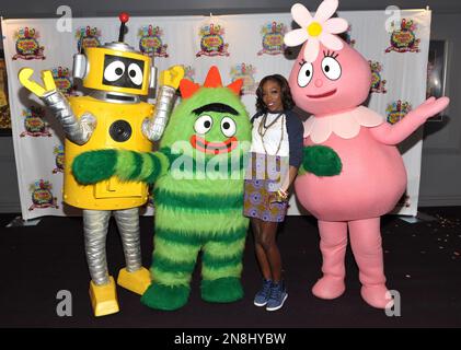 Estelle Swaray, 2nd from right, poses with Plex, Brobee and Foofa