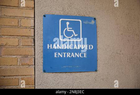 Handicap sign parking lot accessible symbol Stock Photo