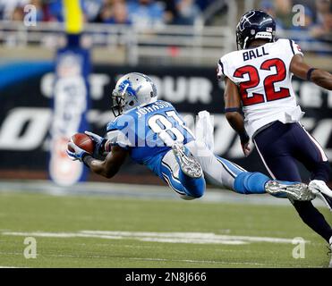 Detroit Lions Calvin Johnson is brought down by the Baltimore Ravens  defense during the second quarter at M&T Bank Stadium on August 17, 2012 in  Baltimore, Maryland. UPI/Kevin Dietsch Stock Photo - Alamy