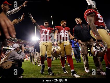 San Francisco 49ers guard Bruce Collie (L) and wide receiver Jerry Rice  during Super Bowl XXIV in New Orleans, Louisiana, January 28, 1990. The  49ers beat the Denver Broncos 55–10. (AP Photo/NewsBase