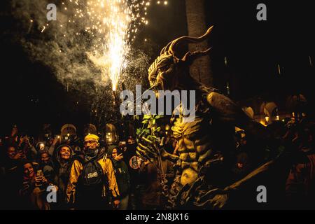 Barcelona, Spain. 11th Feb, 2023. A fire beast sets of its flying sparks during the 'Correfocs' (fire-runs) at Barcelona's winter city festival 'Santa Eulalia' 2023 Credit: Matthias Oesterle/Alamy Live News Stock Photo