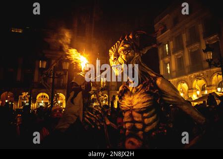 Barcelona, Spain. 11th Feb, 2023. A fire beast sets of its flying sparks during the 'Correfocs' (fire-runs) at Barcelona's winter city festival 'Santa Eulalia' 2023 Credit: Matthias Oesterle/Alamy Live News Stock Photo