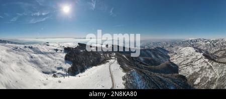 Stara Planina Babin Zub mountain in serbia covered with snow with road in winter day panorama tourist destination and ski center in Serbia Stock Photo