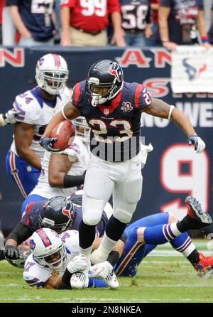 Oct 16, 2011; East Rutherford, NJ, USA; Buffalo Bills strong safety George  Wilson (37) pulls on the jersey of New York Giants wide receiver Victor  Cruz (80) during the third quarter at