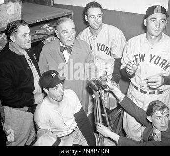 FILE ** Former New York Yankees teammates Phil Rizzuto, left, and Joe  DiMaggio share a moment at the Yankees' 45th annual Old Timers Classic  ceremony at Yankee Stadium in New York