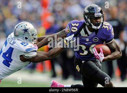 Photo: Dallas Cowboys Gerald Sensabaugh tackles New York Giants Bear Pascoe  at MetLife Stadium in New Jersey - NYP20120101112 