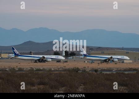 ANA, All Nippon Airways, Boeing 777 jets shown in storage at Rutan Field in Kern County. Stock Photo