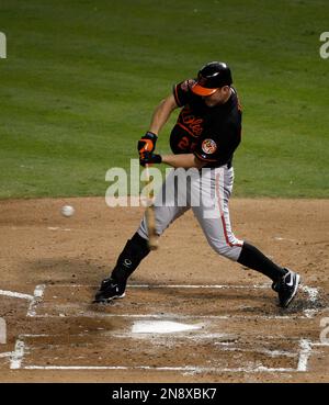 Baltimore Orioles designated hitter Jim Thome (25) warms up at