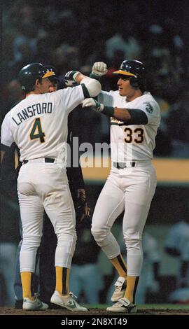 Oakland Athletics' Jose Canseco, right, and fiancee Esther Haddad of ...