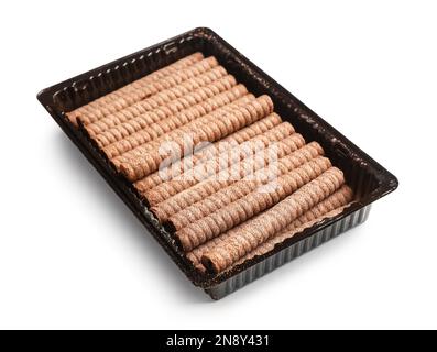 Box with delicious chocolate wafer rolls isolated on white background Stock Photo
