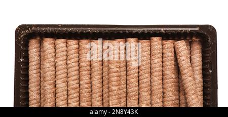 Box with delicious chocolate wafer rolls isolated on white background Stock Photo