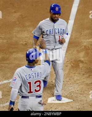 The Chicago Cubs' Anthony Rizzo, left, is congratulated by teammate Bryan  LaHair (6) following his two-run home run against the Houston Astros in the  fifth inning at Wrigley Field in Chicago, Illinois