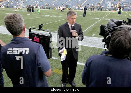 ESPN reporter John Sutcliffe reports from the sidelines during the first  half of an NFL football game between the Green Bay Packers and Detroit  Lions Monday, Oct. 14, 2019, in Green Bay