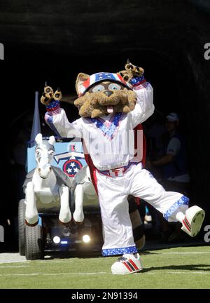 T-Rac, the Tennessee Titans mascot, performs before a preseason NFL  football game between the Titans and the Pittsburgh Steelers Sunday, Aug.  25, 2019, in Nashville, Tenn. (AP Photo/James Kenney Stock Photo 