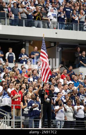 Dancers hold flags of nations of hispanic heritage honoring Hispanic  Heritage Month prior to a NFL football game between the Miami Dolphins and  Dallas Cowboys in Arlington, Texas, Sunday, Sept. 22, 2019. (