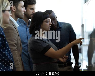 Creative business people, whiteboard and planning in brainstorming, schedule or strategy at office. Group of employee workers in teamwork Stock Photo