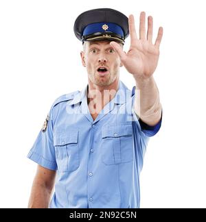 Police, stop and officer or law enforcement with legal authority isolated against a studio white background. Man, cop and person with uniform for Stock Photo