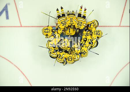 Detroit, Michigan, USA. 11th Feb, 2023. The University of Michigan hockey team huddles before puck drop in their game against Michigan State at Little Caesars Arena in Detroit. The University of Michigan won the game 4:3 (Credit Image: © Scott Hasse/ZUMA Press Wire) EDITORIAL USAGE ONLY! Not for Commercial USAGE! Stock Photo