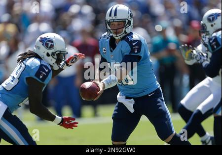 Tennessee Titans quarter back Jake Locker (10) runs against the Miami  Dolphins during first half action at Sun Life Stadium November 11, 2012 in  Miami, Florida. The Titans beat the Miami Dolphins37-3