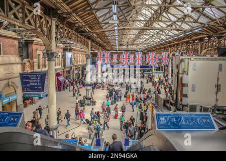 Inside view of London's Victoria Station.Victoria is the second busiest railway terminus in London.London UK,June 12 2018 Stock Photo