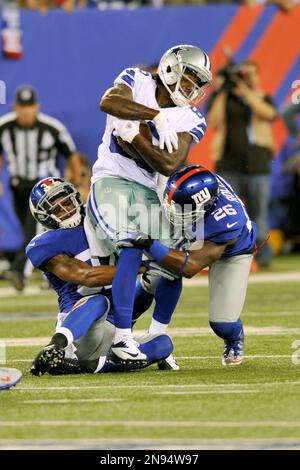 New York Giants defensive back Michael Coe, center, is shown before an NFL  football game between the New York Giants and the Philadelphia Eagles  Sunday, Nov. 20, 2011 in East Rutherford, N.J. (