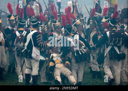 Members of historic clubs wearing 1812-era uniforms preparing in their ...
