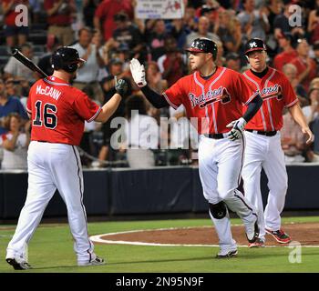 Freddie Freeman of the Atlanta Braves and Chipper Jones prior to the