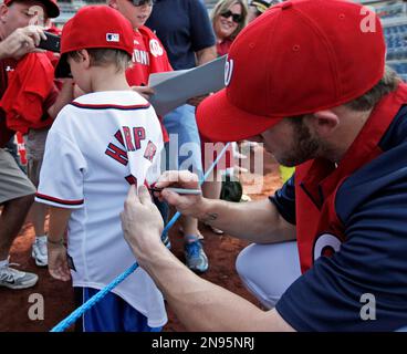 Washington Nationals right fielder Bryce Harper wears shoes with Jackie  Robinson's jersey number for Jackie Robinson Day during a game against  Colorado Rockies at Nationals Park Sunday, April 15, 2018, in Washington. (