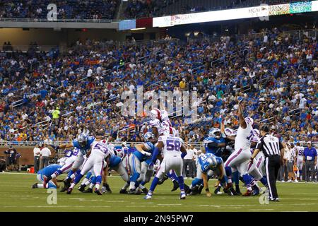 Buffalo Bills professional american football club, silhouette of NFL  trophy, logo of the club in background Stock Photo - Alamy