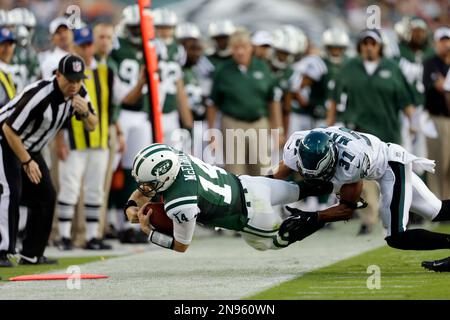 Philadelphia Eagles defensive back Curtis Marsh (31) celebrates his tackle  with teammate Brandon Hughes (27) during the second half of an NFL football  game against the Dallas Cowboys on Saturday, Dec. 24