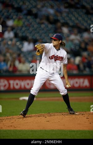 Cleveland Indians starting pitcher Chris Seddon, left, walks off the ...