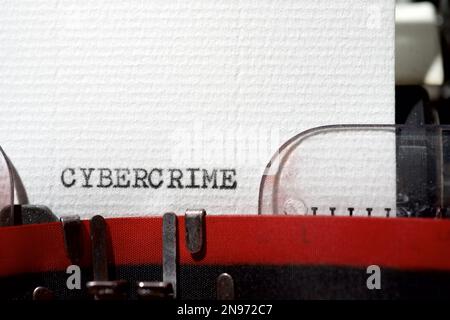 Cybercrime word written with a typewriter. Stock Photo