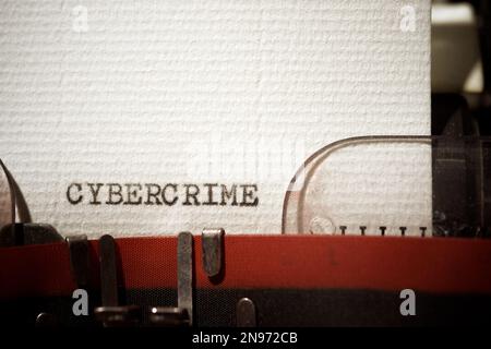 Cybercrime word written with a typewriter. Stock Photo
