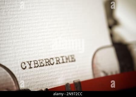 Cybercrime word written with a typewriter. Stock Photo