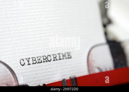 Cybercrime word written with a typewriter. Stock Photo