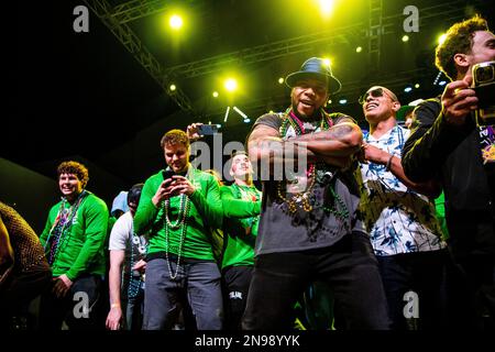 Flo Rida performs with the Tulane football team during Shorty Gras ...