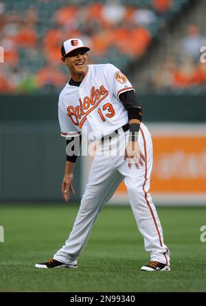 Baltimore Orioles' Adam Jones, left, hits teammate Manny Machado in the  face with a pie after a baseball game against the Oakland Athletics in  Baltimore, Wednesday, Aug. 23, 2017. (AP Photo/Patrick Semansky