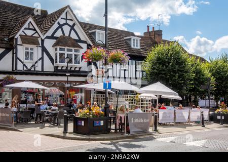 EAST GRINSTEAD, WEST SUSSEX/UK - AUGUST 10 : Cafe culture in the High Street in East Grinstead on August 10, 2021. Unidentified people Stock Photo