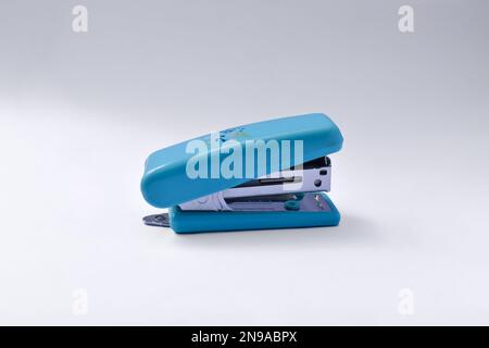 Office stationary Blue stapler isolated on white background Stock Photo