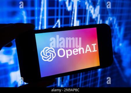 Digital composite of Microsoft ChatGPT OpenAI chatbot logo on phone screen Stock Photo