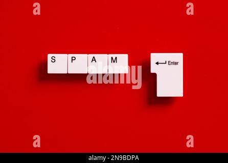 Online spam messages or sending spam messages concept. Computer keyboard keys with the word spam. Stock Photo