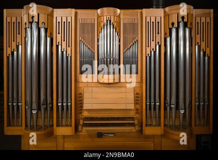 Small classical wooden church pipe organ isolated Stock Photo