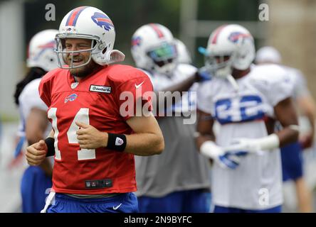 Buffalo Bills Ryan Fitzpatrick (14) hands off to Marshawn Lynch (23) in  this NFL football game between the Buffalo Bills and Jacksonville Jaguars  at Municipal Stadium in Jacksonville, Florida. The Jaguars defeated