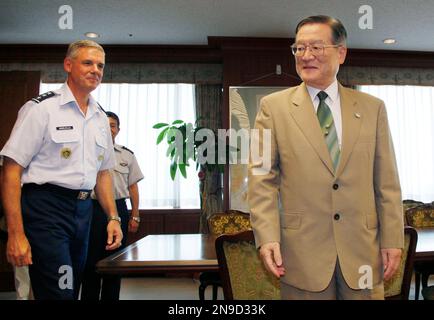 New U.S. Forces Japan Commander Lt. Gen. Salvatore A. Angelella, left, is escorted by Japanese Defense Minister Satoshi Morimoto before a meeting at Defense Ministry in Tokyo Friday, July 27, 2012. (AP Photo/Koji Sasahara)