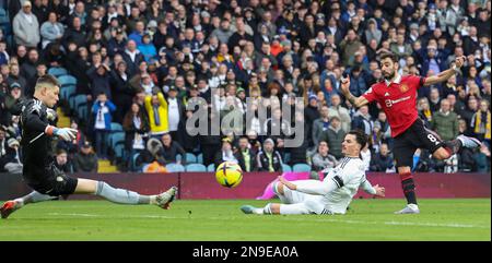 Elland Road, Leeds, Yorkshire, UK. 12th Feb, 2023. Premier League Football, Leeds United versus Manchester United; Manchester United's Bruno Fernandes shot is saved Leeds United's Illan Meslier with Leeds United's Robin Koch close by Credit: Action Plus Sports/Alamy Live News Stock Photo